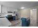 Bright, modern kitchen with two-tone cabinets, stainless steel appliances, and butcher block island at 6817 Guess Rd, Hillsborough, NC 27278