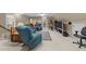 Finished basement with plush seating, large tv, and exercise area for recreation and relaxation at 8909 Wellsley Way, Raleigh, NC 27613