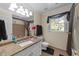 Bathroom featuring granite countertops and traditional fixtures at 8909 Wellsley Way, Raleigh, NC 27613