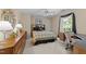 Bedroom featuring neutral walls and natural light at 8909 Wellsley Way, Raleigh, NC 27613