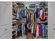 Walk-in closet with ample shelving and hanging space at 8909 Wellsley Way, Raleigh, NC 27613