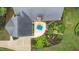 Overhead view of landscaped backyard including a large patio with furniture set at 901 Tamaras Cir, Wake Forest, NC 27587