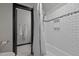 Modern bathroom with subway tile surround, and a view into the vanity area at 901 Tamaras Cir, Wake Forest, NC 27587