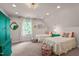 Bedroom features two twin beds, colorful ottomans and a large green armoire at 901 Tamaras Cir, Wake Forest, NC 27587