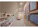 Hallway with built-in bookshelves and space for displaying artwork at 901 Tamaras Cir, Wake Forest, NC 27587