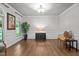 Inviting living room with hardwood floors, stylish furniture, and ample natural light at 901 Tamaras Cir, Wake Forest, NC 27587