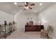 Bright office space featuring a ceiling fan, large desk, and decorative bull horns above desk at 901 Tamaras Cir, Wake Forest, NC 27587