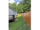 View of the backyard area with a wooden fence at 906 Camden Ave, Durham, NC 27701