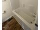 Close-up of the bathtub in the bathroom with white walls at 906 Camden Ave, Durham, NC 27701