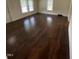 Bright living room showcases hardwood flooring, natural lighting, and inviting space at 906 Camden Ave, Durham, NC 27701