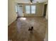 Cozy living room featuring natural light and ceiling fan at 906 Camden Ave, Durham, NC 27701