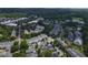 Aerial view showcasing a neighborhood with tree-lined streets and varied architectural styles at 922 Edgewater Cir, Chapel Hill, NC 27516
