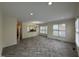 Open-concept living area with hardwood floors connecting the living room, dining, and kitchen spaces at 922 Edgewater Cir, Chapel Hill, NC 27516