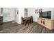 Bright dining room with a wooden table, hardwood floors, and natural light at 937 Baldwin Ridge Rd, Apex, NC 27523