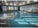 A well-lit indoor swimming pool facility with accessible features and relaxing environment at 937 Baldwin Ridge Rd, Apex, NC 27523