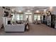 Spacious resident lounge with fireplace, comfortable seating, and elegant decor at 937 Baldwin Ridge Rd, Apex, NC 27523