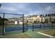 Community tennis courts with well-maintained court and surrounding landscaping at 937 Baldwin Ridge Rd, Apex, NC 27523