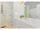 Bright bathroom with a large vanity, neutral color scheme, and a shower with curtain at 101 Abram Way, Clayton, NC 27520