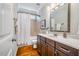 Bathroom showcasing a vanity with great storage, white countertop, and tub-shower combination at 104 Treywood Ln, Chapel Hill, NC 27516