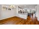 Dining room with chandelier, door to the porch, and hardwood floors at 104 Treywood Ln, Chapel Hill, NC 27516