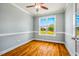 Bright and airy office space with hardwood floors, large windows, and classic trim work at 104 Treywood Ln, Chapel Hill, NC 27516