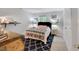 Cozy bedroom with stylish décor, including a patterned rug and complementary artwork at 105 Walter Hagen Dr, Mebane, NC 27302
