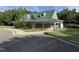 Community clubhouse featuring modern architecture and a serene exterior at 105 Walter Hagen Dr, Mebane, NC 27302
