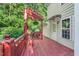 Inviting outdoor deck with a pergola and view of the serene backyard at 105 Walter Hagen Dr, Mebane, NC 27302
