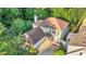 An aerial view of a well-maintained home with a driveway and manicured landscaping at 105 Walter Hagen Dr, Mebane, NC 27302