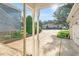 Inviting front porch framed by white columns and landscaping, offering a glimpse of the neighborhood at 105 Walter Hagen Dr, Mebane, NC 27302