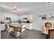 Bright kitchen with white cabinetry, stainless steel appliances, and a spacious island with seating at 105 Walter Hagen Dr, Mebane, NC 27302