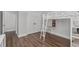 Bedroom featuring a bed with a desk and ladder and hardwood floors at 1108 Lowland St, Apex, NC 27523