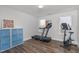 Bright exercise room with space for equipment, natural light, and durable floors at 1108 Lowland St, Apex, NC 27523
