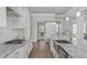Modern kitchen features sleek stainless steel appliances and an open floor plan at 1108 Lowland St, Apex, NC 27523