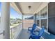Charming front porch featuring two Adirondack chairs, white columns, and a view of the neighborhood at 1108 Lowland St, Apex, NC 27523