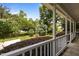 Inviting back porch with views of lush landscaping and a tranquil backyard at 112 Autumn Ridge Dr, Knightdale, NC 27545