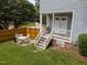 Inviting backyard patio featuring a grill and outdoor seating, perfect for entertaining guests at 112 Autumn Ridge Dr, Knightdale, NC 27545