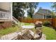 Charming backyard oasis, perfect for entertaining with outdoor seating and BBQ grill at 112 Autumn Ridge Dr, Knightdale, NC 27545