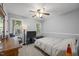 Cozy bedroom with natural light, desk area and ceiling fan at 112 Autumn Ridge Dr, Knightdale, NC 27545