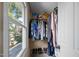 Organized walk-in closet with window that allows for natural light and ample storage space at 112 Autumn Ridge Dr, Knightdale, NC 27545