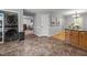 The kitchen area offers a laundry closet and tiled flooring leading to another room at 112 Autumn Ridge Dr, Knightdale, NC 27545
