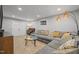 Spacious living room with comfortable seating, recessed lighting, and a walk-out at 112 Autumn Ridge Dr, Knightdale, NC 27545