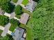 An aerial view shows the neighborhood with mature trees and well-manicured lawns at 117 Drakewood Pl, Cary, NC 27518