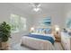 Cozy bedroom with a queen-size bed, soft blue accents, and ample natural light at 117 Drakewood Pl, Cary, NC 27518