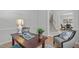 Comfortable home office with hardwood floors, a desk, and neutral decor with chair at 117 Drakewood Pl, Cary, NC 27518