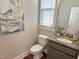 Neat bathroom featuring a granite countertop vanity and modern fixtures at 118 Chestnut St, Durham, NC 27707