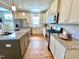 Well-appointed kitchen featuring granite countertops, stainless steel appliances, and a center island at 118 Chestnut St, Durham, NC 27707