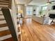 Spacious living room with hardwood floors, a fireplace, and lots of natural light at 118 Chestnut St, Durham, NC 27707