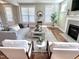 Inviting living room with hardwood floors, fireplace, and stylish decor at 118 Chestnut St, Durham, NC 27707