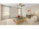 This charming bedroom is arranged as a playroom, with natural light and room to play at 1214 Valley Dale Dr, Fuquay Varina, NC 27526